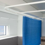 Cubicle curtain track with disposable curtains