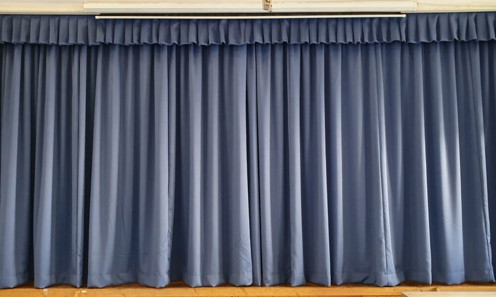 School Theatres Prepping Stage Curtains Before Term Starts
